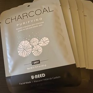 Set of 5 Charcoal Sheet Mask-BONUS Makeup Bag.